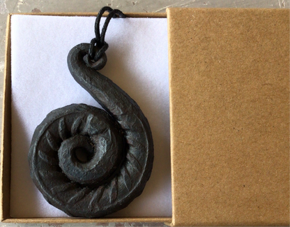 Hand forged spiral pendant