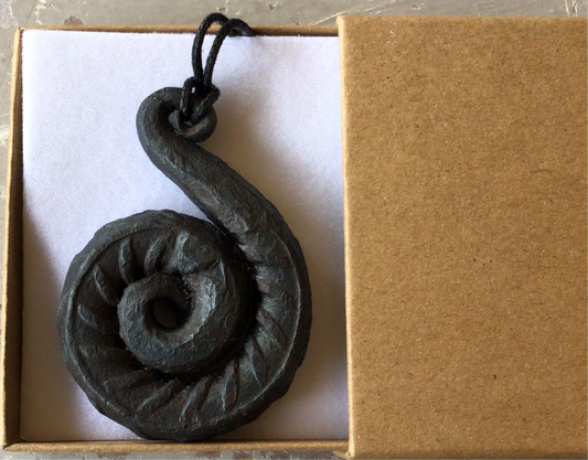 Hand forged spiral pendant