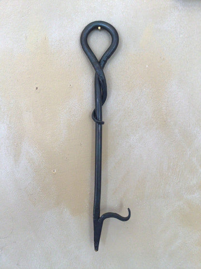 Stove poker by MUST Forge