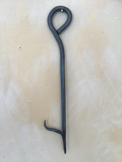 Stove poker by MUST Forge