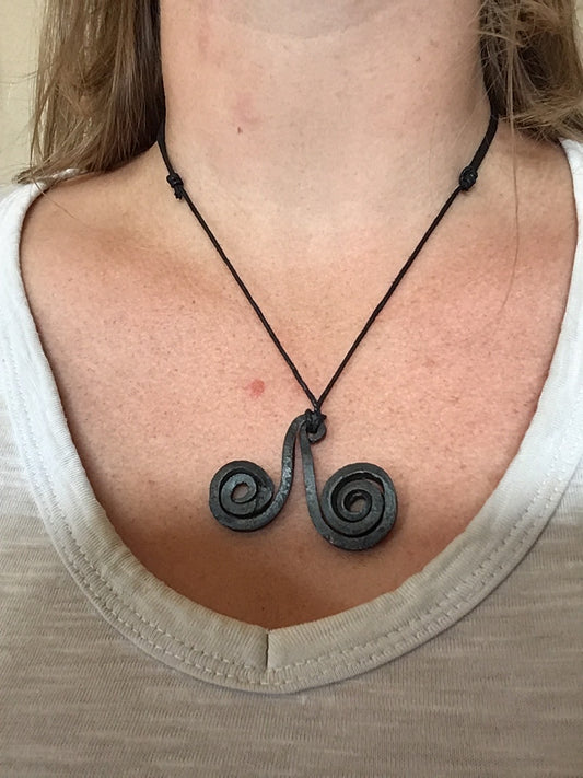 Hand forged pendant double spiral