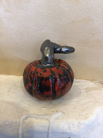 Ceramic red and black spotty pumpkin