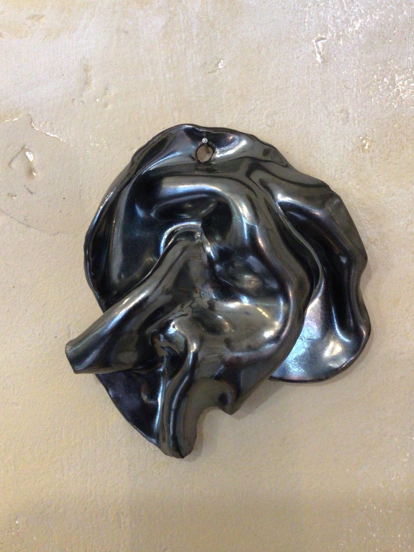Crumpled ceramic wall hanging by Steph House