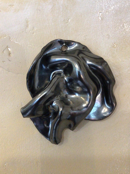 Crumpled ceramic wall hanging by Steph House