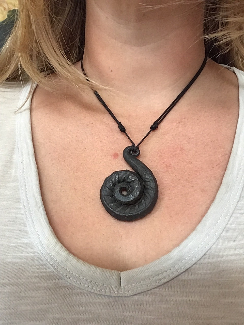 Hand forged spiral pendant