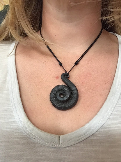 Hand forged spiral pendant