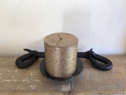 Forged looped candlestick by Piers Edsall