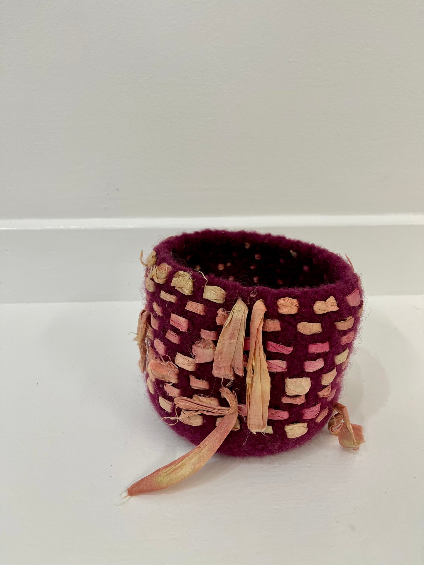 Maroon basket by Linda Quashie