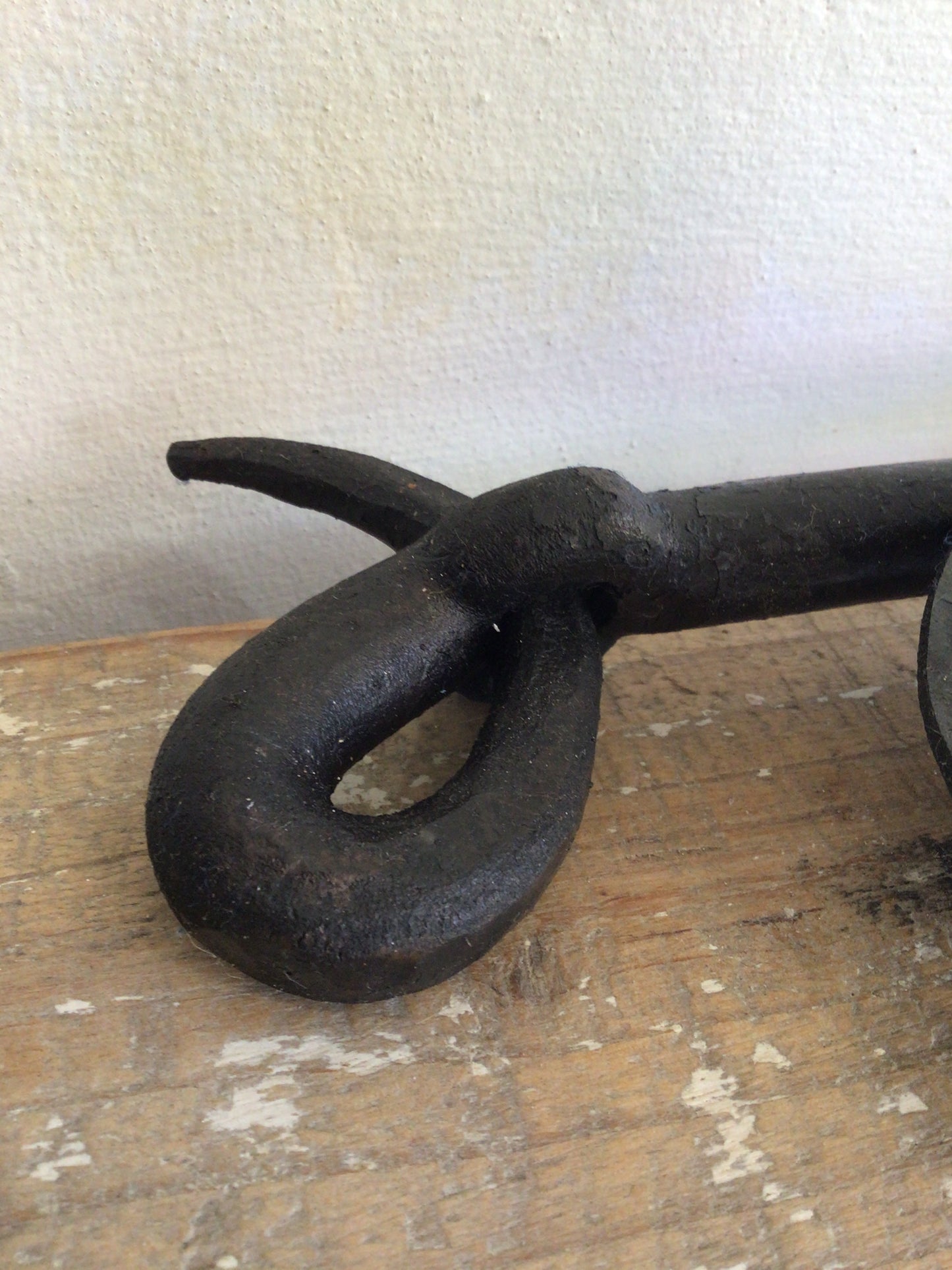 Forged looped candlestick by Piers Edsall