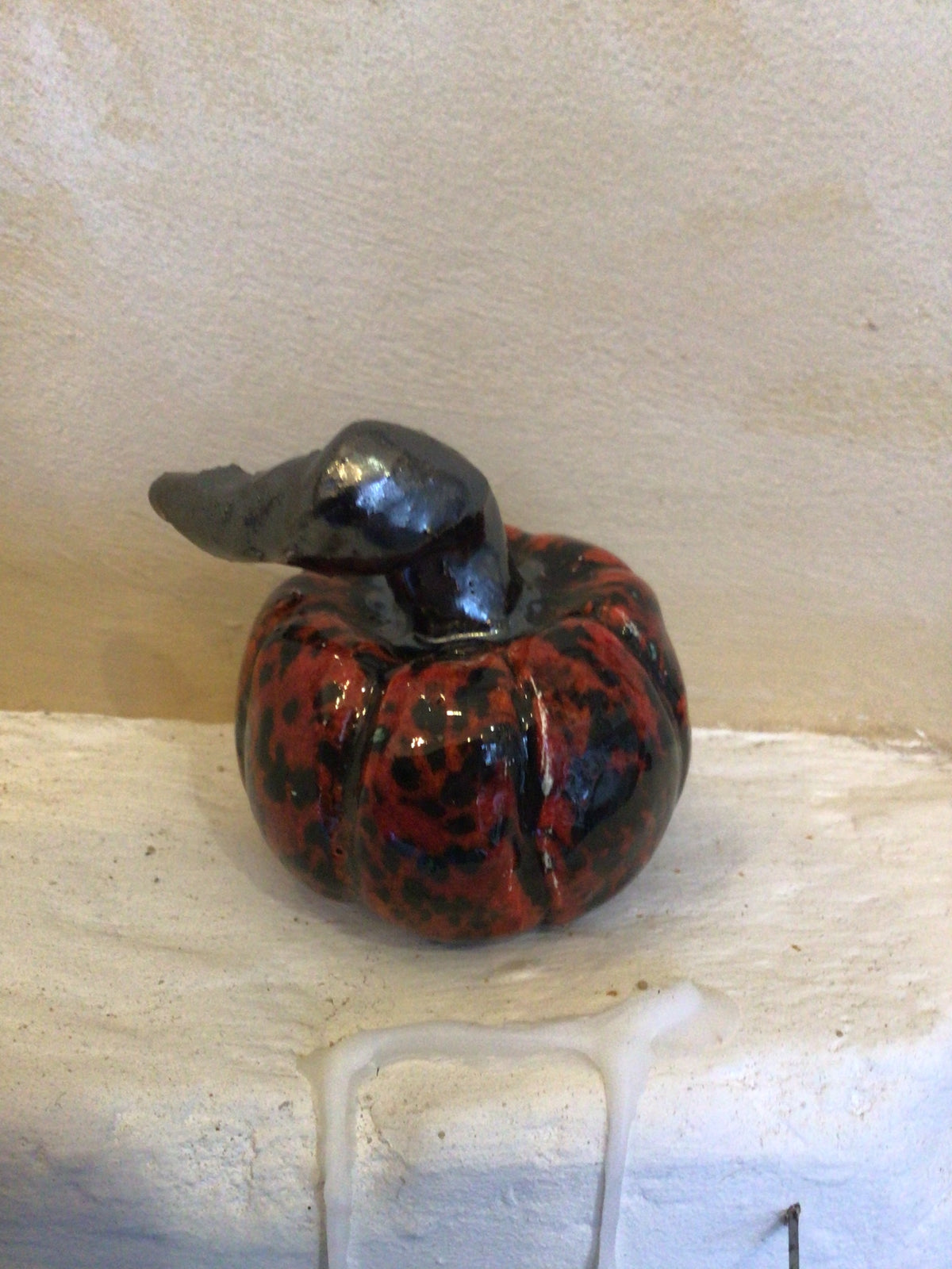 Ceramic red and black spotty pumpkin