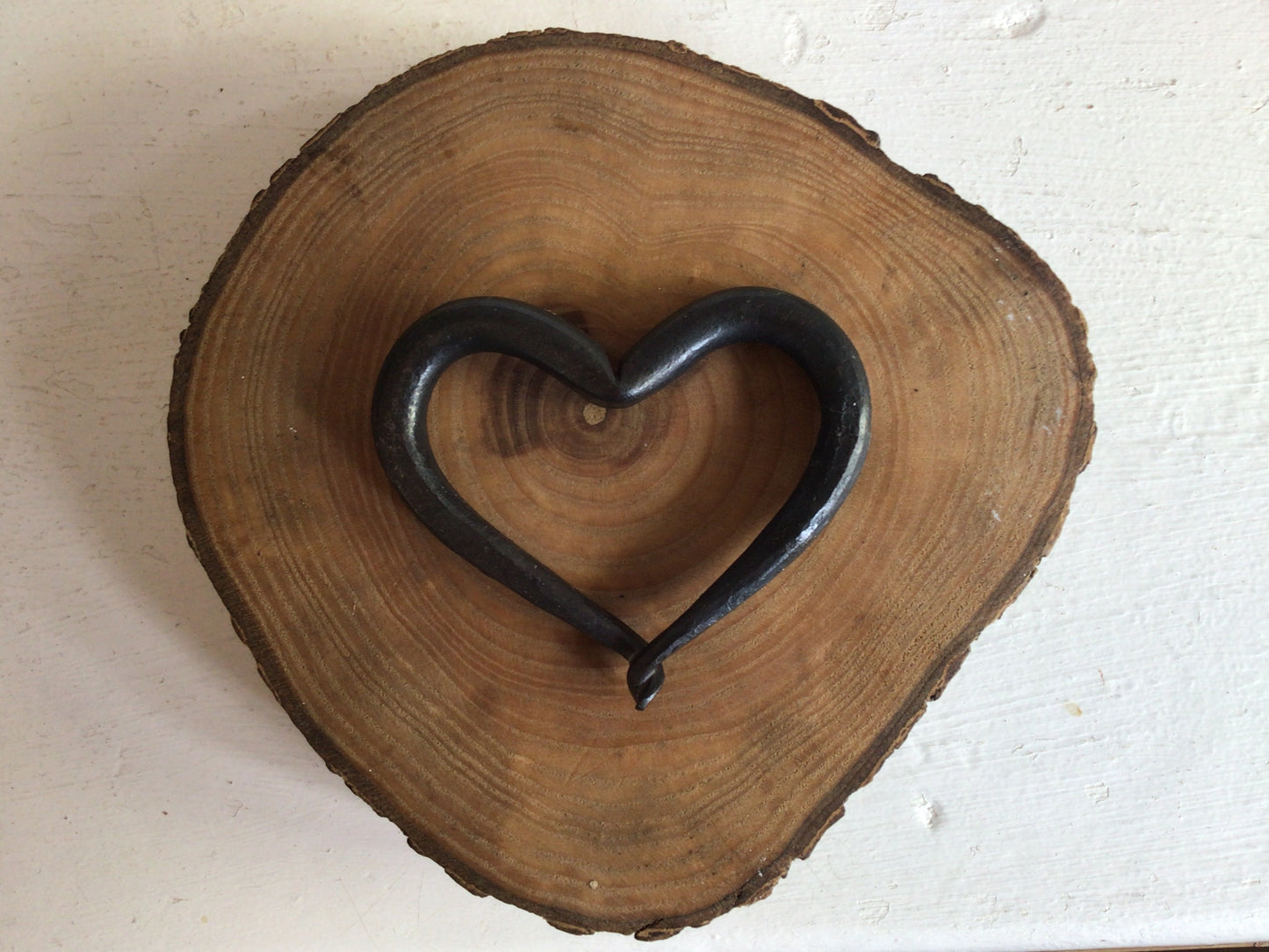 Our signature hand forged heart