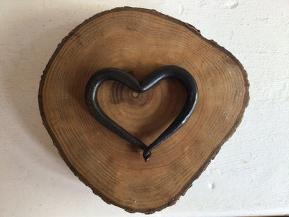 Our signature hand forged heart